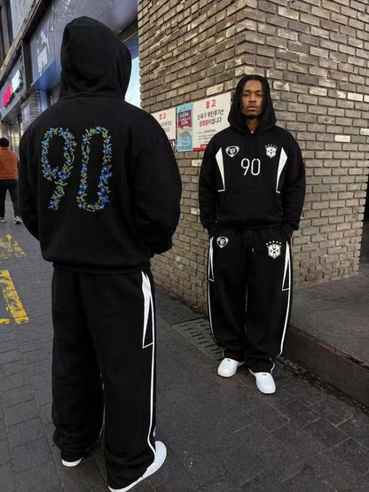 Black Botanical 90 graphic hoodie and jogger set shown from front and back