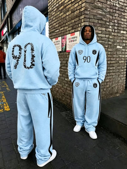 Light blue Botanical 90 graphic hoodie and jogger set shown from front and back